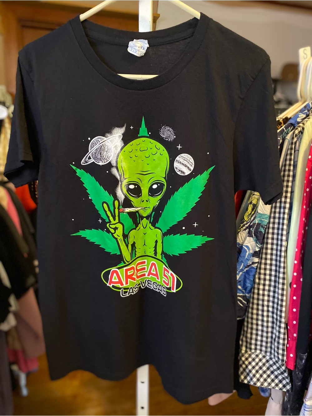 Black T-Shirt with Neon Green Alien and Leaf Graphic